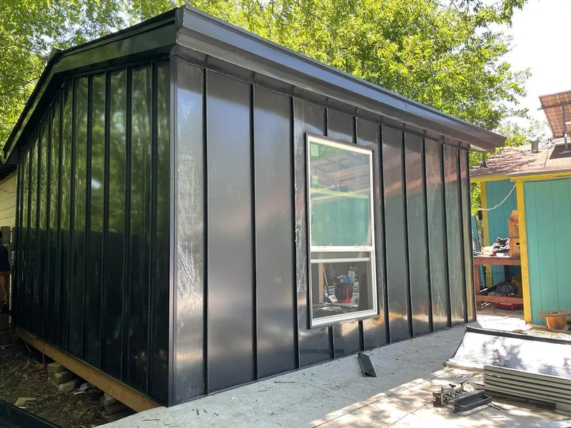 Black standing seam metal wall panels for Metal Roof Installation in Thornapple