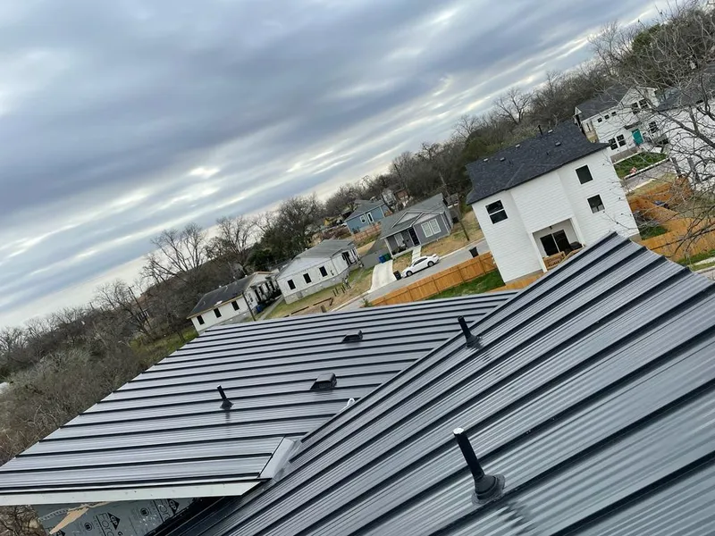 Standing seam metal roof panels with vents for Skylight Repair in Thornapple